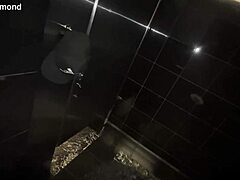 Horny brunette licks and swallows monster cock in hotel bathroom handjob