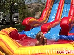 i toy lesbian beauties' pussies outdoors with strapon