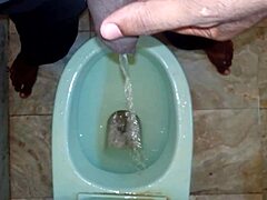 a boy pees with a black man in the story