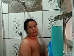 Gorgeous Latina brunette shows off her wet pussy while taking a shower