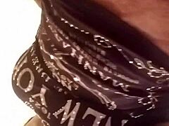 bbw woman teases with ripped clothes in retro film.