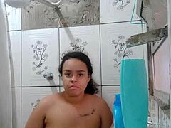 Gorgeous Latina brunette shows off her wet pussy while taking a shower