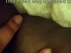 bbw woman teases with ripped clothes in retro film.