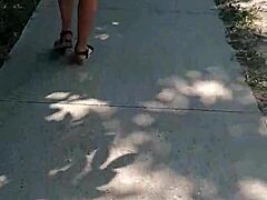 Publicly naked on the street flashing ass and nude milf body.