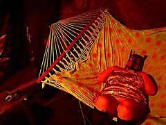 getting frisky in a tent fingering her wet hole in a hammock