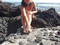 Seductive stepmom shows foot fetish on public beach with big natural tits