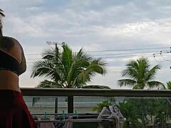 Exhibitionist Flashes Ass On Balcony