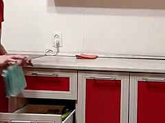 Housewife teases with smelly socks and wet pussy in kitchen
