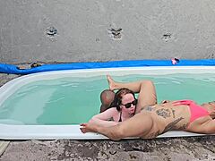 Interracial creampie in pool with tattooed amateurs