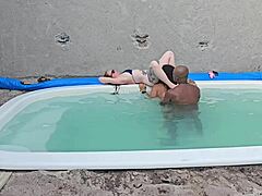 Interracial creampie in pool with tattooed amateurs