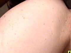 Redhead with tattoo stretched by big black cock.