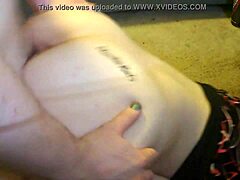 Girlfriend kneels for oral sex in front of the desk.