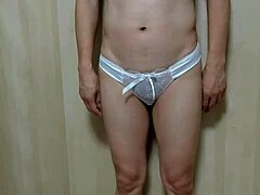 hey, check out this japanese girl in gym clothes, sheer lingerie, school swimsuit doing anal play with buttplug