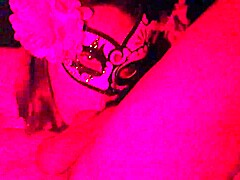 Masked in red light, this Latina gives a deep homemade blowjob on that cock