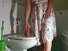 Hey, this hot mommy hides in the toilet to fuck a big dildo with close up riding until orgasm.