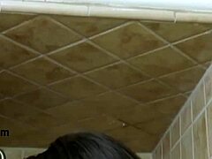 Stunning brunette model took a relaxing shower.