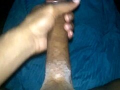 Feeling so aroused while stroking my massive black cock alone at home.