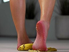 petite brunette girl casually crushes fruits with high heels in hot footfetish solo scene, showing off her feet and shoes softly