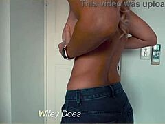 hey, watch this wife stripping from denim shorts, showing big tits 😏