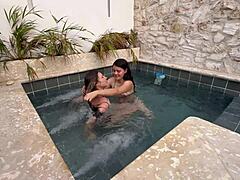 Two hot Colombian lesbians finger and masturbate in public pool. They worry about getting caught outdoors.