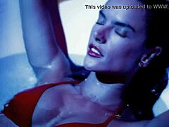 hey 😏 alessandra ambrosio is teasing with a hot striptease, wanna watch her undress slowly?