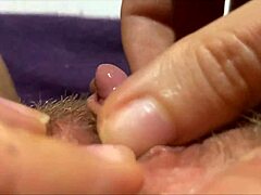 Huge clitoris rubbing and jerking to orgasm in close up