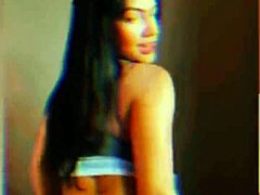 Safada energetically rebolando her hips while dancing funk with intense orgasmic moves in a lively setting.