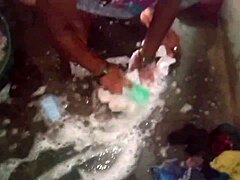 sexy aunty washes her dress in the bathroom subtly