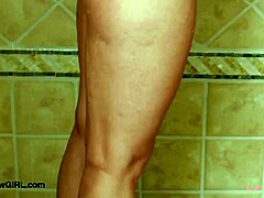 teen blonde model takes a relaxing shower after photoshoot