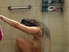 Influencer with curly blonde hair caught in solo bath moment 🛁