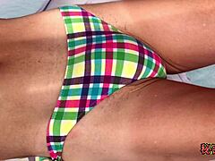 College girl in sexy bikini masturbates with handjob to orgasm in bathroom shower, stripping uniform for outdoor beach fetish play.