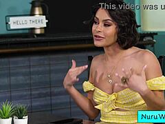 Sensual busty brunette masseuse prepares her tattooed teen client for a wet nuru massage session.