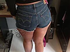 Wearing sexy shorts with tan lines on beautiful tanned body