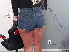 Wearing sexy shorts with tan lines on beautiful tanned body