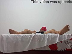 Newbie in the classroom bends over to flash and masturbate with an inflated condom for quick solo thrill.