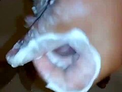 Xrated strokes his cock in the shower with intense masturbation