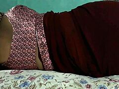 SANJANA AUNTY SHOWING ASS IN MAROON SAREE!