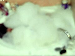 In the bathroom, this boy takes a solo bubble bath, focusing on his feet and bare body in a casual homemade video.