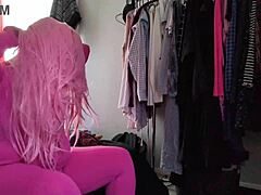 She slipped into the stretchy pink bodysuit, feeling it hug her chubby curves and fat ass tightly during the try-on.