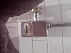 Amateur Ebony Granny Takes a Piss at Rest Stop on I-95 South Bound in Outdoor Public Bathroom with Wet Pussy Exposed