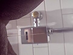 Amateur Ebony Granny Takes a Piss at Rest Stop on I-95 South Bound in Outdoor Public Bathroom with Wet Pussy Exposed