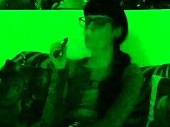 beth kinky as sexy goth domina smokes cigarette in green light hd