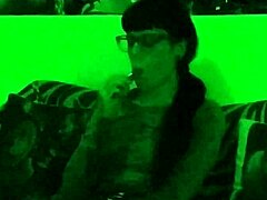 beth kinky as sexy goth domina smokes cigarette in green light hd