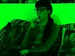 beth kinky as sexy goth domina smokes cigarette in green light hd