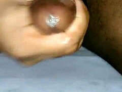 This hot young brunette with a big ass stripped to her underwear for a solo handjob session, stroking his cock until climax