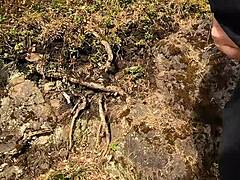 chubbykaot explores the forest solo with belly flashing in outdoor nature setting