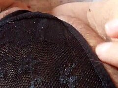 Gretala, pregnant and in a transparent thong, flashes sensually while exhibiting her body in public