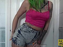 Inked fetish submissive gets ballgagged and throats in intense session