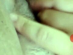 Masturbating solo with intense fingering leading to orgasm