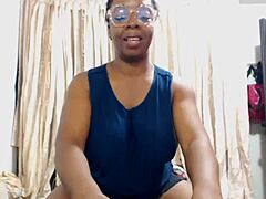 ebony mom subtly flexes her big tits with muscular bodybuilder flair